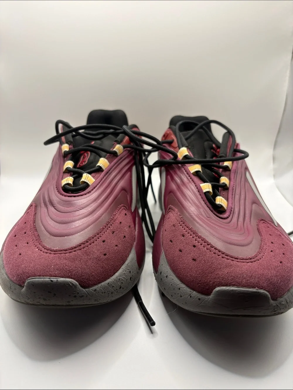 adidas OZELIA Men’s Burgundy and Black Running Sneaker with Yellow Accents